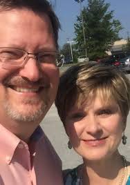 Rose color, wear it with or without crossbody strap, soft leather.