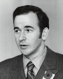 Sharp. Mitchell Sharp, former Deputy of Trade and Commerce, proposes Canada  help form an alliance to work toward freer world trade