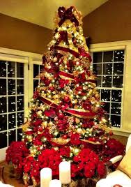 The light red and golden decors do not hurt the eyes and perfectly match the white walls of the home. Gold Red Christmas Tree Red And Gold Christmas Tree Christmas Tree Decorations Diy Gold Christmas Tree
