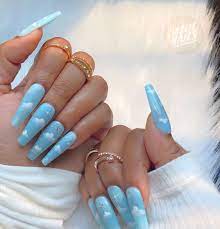 View nail designs of similar length: Blue Cloud Nails Blue Acrylic Nails Baby Blue Nails Long Acrylic Nails Coffin