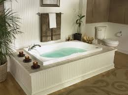 Relaxing hot tub deck surrounded by trees hot tub jacuzzi diy outdoor spa hot tub jacuzzi paver patio project How To Install A Whirlpool Tub Safe Climate