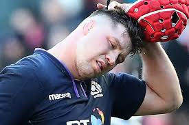 Shaun Edwards and Rob Howley in awkward high-five change during Wales clash  with Scotland