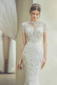Looking for more wedding inspo? 15 Sparkly Wedding Dresses Featuring Stunning Embellishment And Detailing Praise Wedding