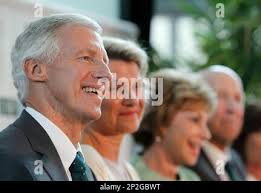 From left, USF alum Barron "Barry" Collier III, his wife Dana Collier, USF  President Judy Genshaft and Les Muma listen to USF Muma College of Business  Dean Moez Limayem (not pictured) during the announcement that the Colliers  will be donating $10.9 ...