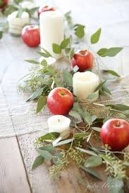 Create A 5 Minute Holiday Table Centerpiece Using Apples Pillar Candles And Eucalyptus With This Simple Tutorial For B Fall Decor Fall Centerpiece Fall Table