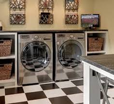 Add the 3/4″ thickness of the plywood sheets and the countertop is actually 41 1/2″ high. Diy Laundry Room Countertop Over Washer Dryer