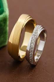 Matching Wedding Bands With Unique Twisted Design Gold Wedding Rings Wedding Rings Unique Couple Wedding Rings Wedding Ring Designs