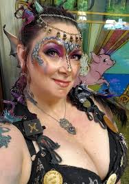 Did any body happen to take a photo of the wingless purple dragonborn. With  this on? I forgot to take a pic of myself and was curious?