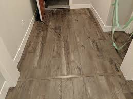 What does transition pieces look like when installed with vinyl flooring : Laminate Flooring Transition Piece
