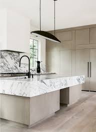 Black And Wood Kitchen Island High Style On The Battery White Marble Kitchen Island Marble Kitchen Island White Marble Kitchen