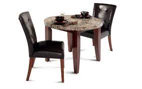 Inspired by brazil and its lush jungle, the ronda table boosts our interior with its richly printed tray! Montibello 40 Round 3 Piece Dining Set Bob S Discount Furniture Kitchen Table Settings Dining Room Furniture Sets Furniture