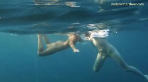Underwater in the sea young babes swimming nude - XNXX.COM