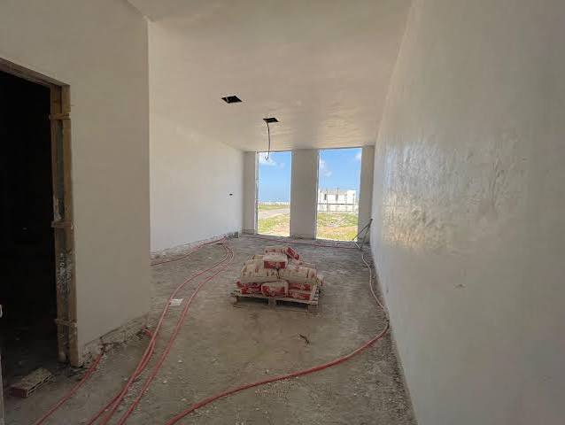 Salon rénovation plâtre lissé — villa Marrakech