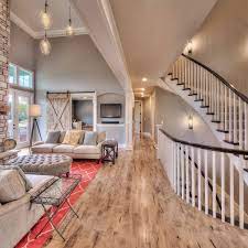 Hearthroom Hardwood Floors Open Floor Plan High Ceilings Sliding Wood Door Home Decor Shops Home Design Decor Home