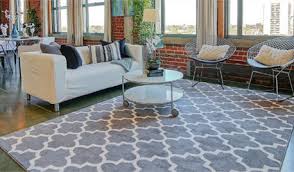 Layering a rug over carpet is a design trend that is growing increasingly popular. How To Run A Wire Under A Rug
