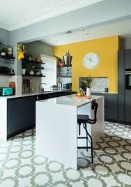 Want To Incorporate Colour Into Your Kitchen We Love This Combination Of Classic Greys With Yellow Kitchen Walls Kitchen Feature Wall Kitchen Design Color