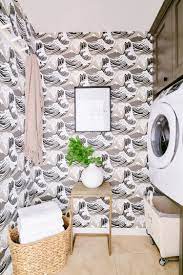 Love this fun laundry room done by @erinhansendesign the wallpaper is to die for & a huge hint as to what you'll be seeing our designs on next @staggdesignshop ! Perfect Small Laundry Room Space Savvy And Stylish Designs