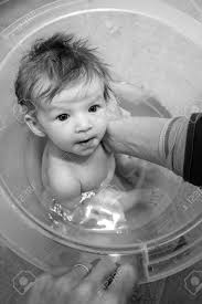 This will allow you to keep one hand on the baby at all times. Two Months Old Baby Having A Bath In The Bucket Stock Photo Picture And Royalty Free Image Image 134214165