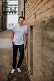 Putting hands in the pockets a man demonstrates calmness and determination. 9 Male Poses Prompts For Portrait Photos Click Love Grow