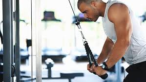 Stand tall, holding a light dumbbell in each hand by your sides with a slight bend in your elbows. 6 Triceps Exercises To Add To Arm Day Active