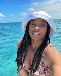 Biles on wednesday became the first olympian with their own custom emoji to be used on twitter. Simone Biles Glows In Makeup Free Vacation Selfie