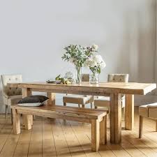 The table and benches are designed with undulating live edges, giving the set a distinct outdoor. Dining With A Bench The Latest Trend Modish Living