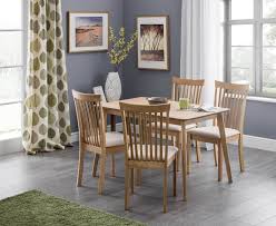 Meticulously crafted from solid oak wood and incredibly versatile, an extending dining table set will look charming in your home. Abdabs Furniture Boden Oak Dining Table 4 Dining Chair Set