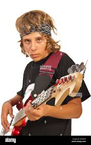 Teen Boy Playing Bass Guitar Isolated On White Background Stock Photo Alamy