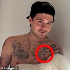 The meanings behind David and Brooklyn Beckham's 200 tattoos REVEALED