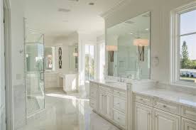 Lighting ideas for a luxurious traditional master bathroom. Traditional White Master Bathroom With Wall Sconces And Raised Panel Cabinets White Master Bathroom Luxury Master Bathrooms Bathroom Remodel Master