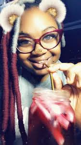 Homemade hibiscus tea with ginger and lemon