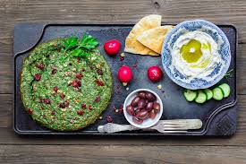 It's worth noting that this recipe is an approximation of ingredients and measurements that i once squeezed out of my mom. Kuku Sabzi Persian Herb Baked Omelet