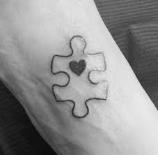Autism Puzzle Piece Tattoo Black And White Simple But Meaningful Autism Awareness Tattoo Autism Awareness Tattoo Autism Tattoos Adoption Tattoo