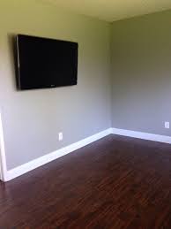 The lrv stands for light reflectance value and measures the percentage of light that a color reflects. Dark Floors High Baseboards And Gray Paint Valspar Woodlawn Colonial Gray Our Newly Modeled F Basement Remodeling Small Basement Remodel Living Room Remodel