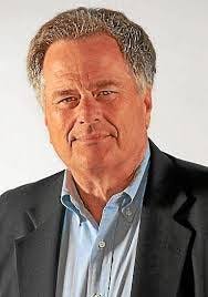 Wherever he hung his clipboard, John Robinson was home