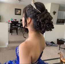 With a slightly raised puff and the hair swept from the side, perfectly falling long strand of curls give 53. Cute Quinceanera Hairstyles 2020 For Long Hair And Short Hair