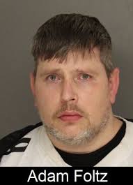 ARREST: We first told you about Adam Foltz, 42, in February when he and a  companion were caught with a large amount of allegedly stolen merchandise  from several stores. Just over a