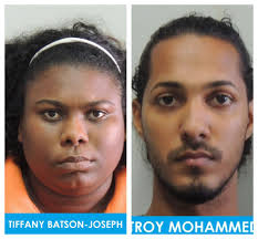 Sales Clerks Charged for Card Skimming