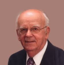 Delbert C. “Del” Holman