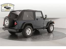 Image result for Brilliant Black 2005 Jeep