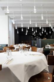 Black And White Restaurant Interior An Artful Black And White Restaurant White Restaurant Restaurant Design Cool Restaurant