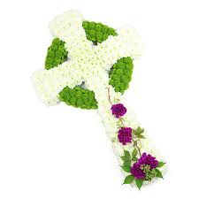 Massed cross with red naomi roses. White Celtic Cross Tribute Affordable Funeral Flowers Arrangements