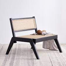 If you want your chair to keep its original color, you must apply teak oil on it. Pembroke Solid Wood Rattan Low Lounge Chair Black Shop Designer Home Furnishings