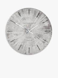 We are very proud to introduce this gorgeous silver sunburst wall clock. Thomas Kent Starburst Analogue Wall Clock Silver