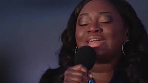Covid nurse sings Amazing Grace at Biden memorial for victims