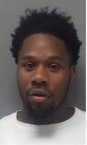 2 men accused of possessing firearms at Monroe high school homecoming  parade, block party