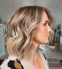 The top is dark brown and transitions into blonde tone about a third of the length. 29 Hottest Medium Length Layered Haircuts Hairstyles