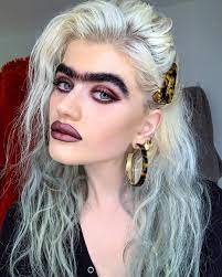 I've got a massive unibrow - trolls turn on me and tell me to die but I  don't care… I think it looks amazing | The Irish Sun