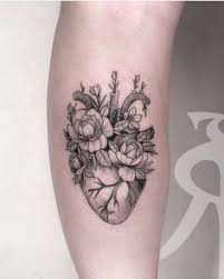 So, here's a little something for them as this tattoo design has both of their favorite things in one place. 35 Heart Flower Tattoo Ideas Heart Tattoo Heart Flower Tattoo Tattoos