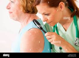See a dermatologist hi-res stock photography and images